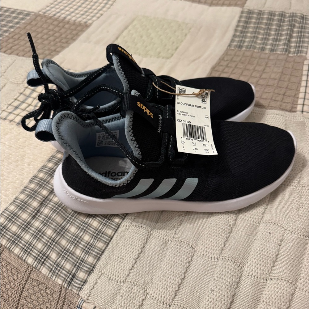 Adidas Black Sneakers with Mesh Upper and Cushioned Sole